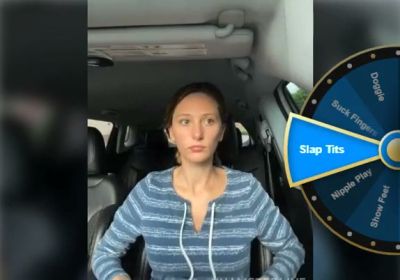 Woman spreads herself open in the front seat of a car - yesvids.com
