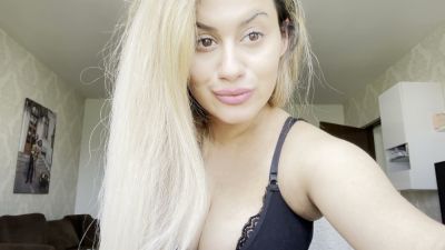 Blonde Romanian porn star pleasures herself on camera in her modern living room - yesvids.com - Romania