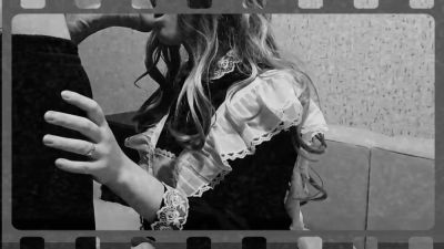 French maid in black and white poses on a sofa with book - yesvids.com - France