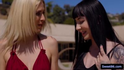 Gothic woman in black stockings embraces her blonde lover outdoors - yesvids.com