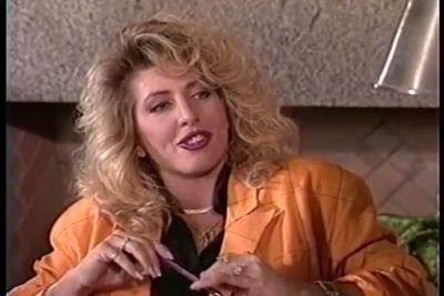 Mature woman in vintage lingerie enjoys intimate moments on the couch - yesvids.com