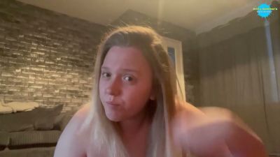 Young blonde solo star teases bare breasts in warm brick-lit room - yesvids.com
