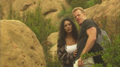 Interracial couple embraces in rocky wilderness before moving to oral pleasure - yesvids.com
