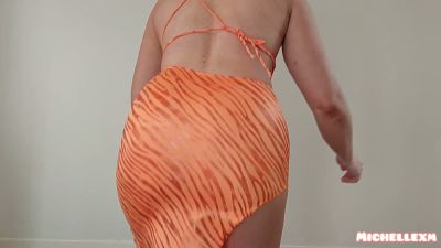 Blonde strips through her lingerie and dress collection with flashing upskirt views - yesvids.com