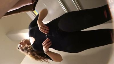 Slender brunette in tight pink leggings caught on camera during a fitting session - yesvids.com