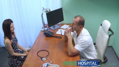 European doctor in white coat treats his patient with oral care on the exam table - yesvids.com