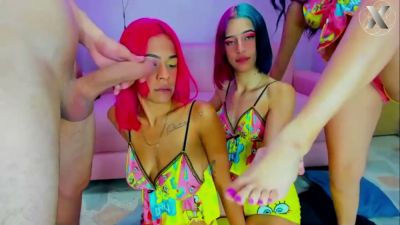 Three women with colorful hair in cartoon dresses take turns on a man's cock - yesvids.com