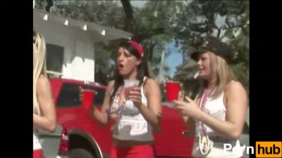 Two young lesbians flash bare skin and grind in public during a wild street party - yesvids.com
