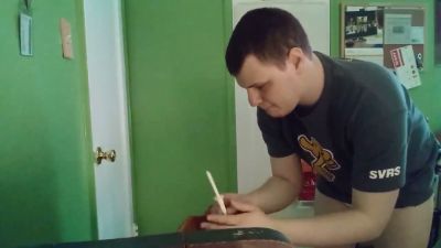 Man prepares an enema in diaper briefs with buttocks exposed in a green room - yesvids.com