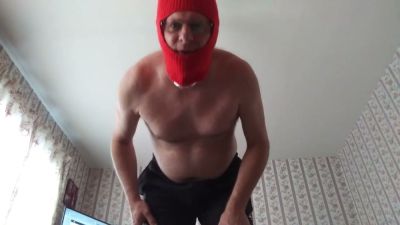 Masked muscular man in red balaclava jerks off on camera - yesvids.com