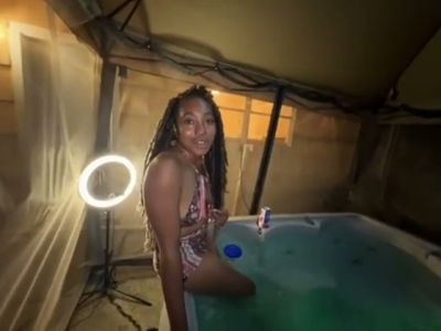 Dark-haired Jamaican beauty bares her curves alone in a glowing hot tub - yesvids.com - Jamaica