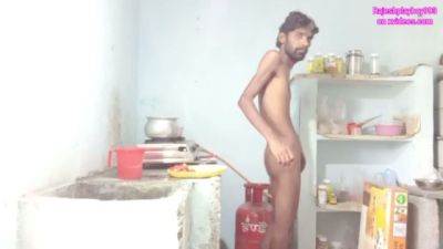 Skinny dark-skinned man jerks off and fingers his ass while cooking in a messy kitchen - yesvids.com
