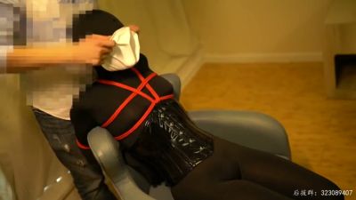 Black latex and red rope bondage session under warm light with Chinese character motif - yesvids.com - China
