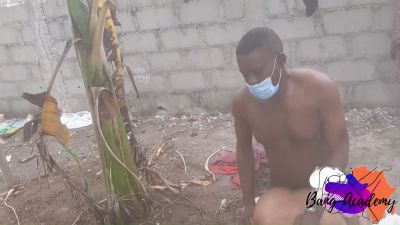 Dark-skinned couple embraces passionately on the dirt ground beneath open skies - yesvids.com - Nigeria