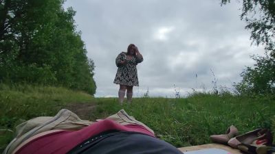 Chubby blonde in knee socks gives outdoor footjob in wooded clearing - yesvids.com
