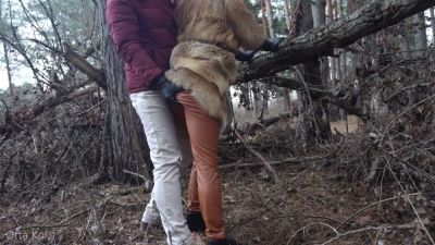 Blonde in fur and leather spreads bare in winter forest during risky outdoor encounter - yesvids.com