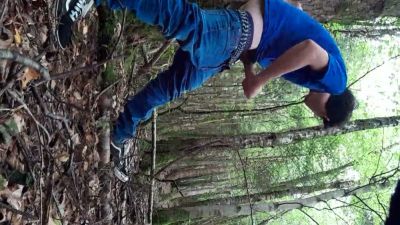 Young man jacks off openly in a sunlit forest clearing - yesvids.com
