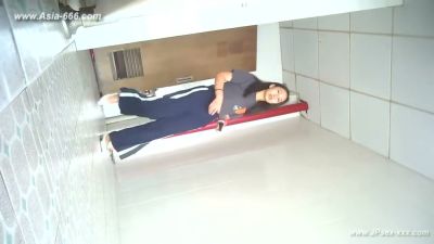 Young Chinese woman unknowingly filmed urinating in a white-tiled bathroom - yesvids.com - China