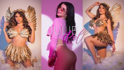Yuli Belle teases in feathers then shifts to black leather for a passionate solo dance - yesvids.com