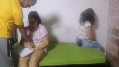 Arab doctor examines patient while colleague observes in the clinic - yesvids.com