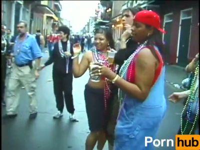 Strangers kiss and strip under festival lights on a crowded beach - yesvids.com