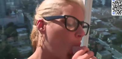Busty blonde in glasses showcases off her fake mounds while wearing green leggings - ah-me.com