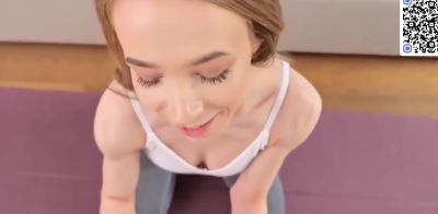Hot Sexy - Slender platinum-blonde in white tank top looks at camera - ah-me.com