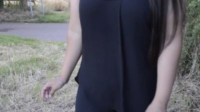 South Asian British woman stands on a grassy path in a quiet public park - yesvids.com - India - Britain - Pakistan
